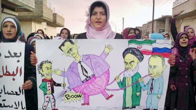 مردم بی دفاع سوریه که از دست بشار اسد و خامنه ای شریک هم جنایتکار او به تنگ آمده اند، در یک کاریکاتوری نشان می دهند که چگونه اسد به وسیله پوتین و خامنه ای باد شده و در هوا می چرخد!.