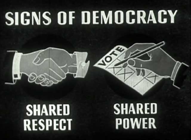 سمبل و نشانه دموکراسی باهم در رأی دادن و انتخابات شرکت داشتن، و با هم در قدرت شریک بودن است. کار همه، برای همه. همه باهم، و برای هم.