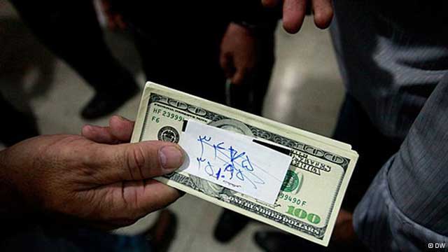 price-of-iranian-rial-crashes-us-dollar-tehran-iran-2012-protests