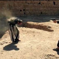 daesh-child-soldier-kills-prisoner-with-handgun-palmyra